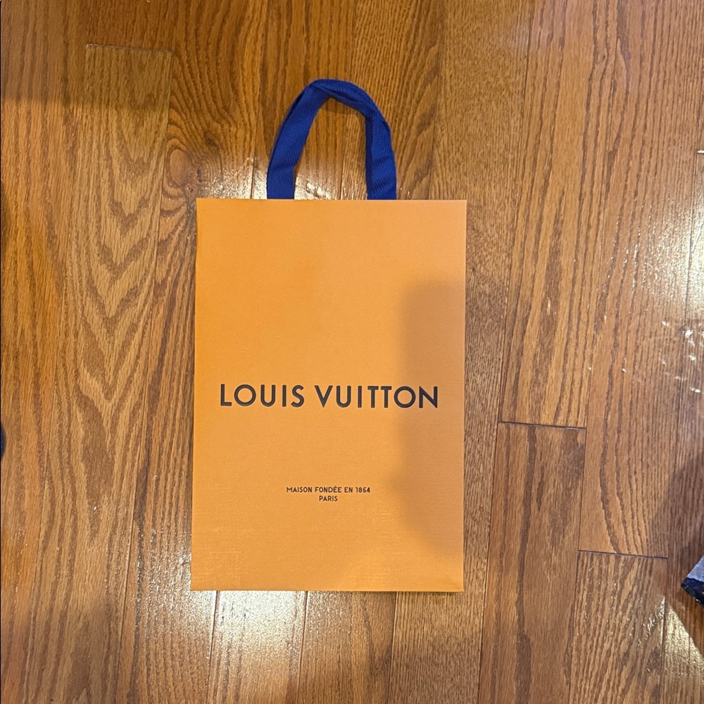 Louis Vuitton Vibrant Orange Bag with Blue Handles